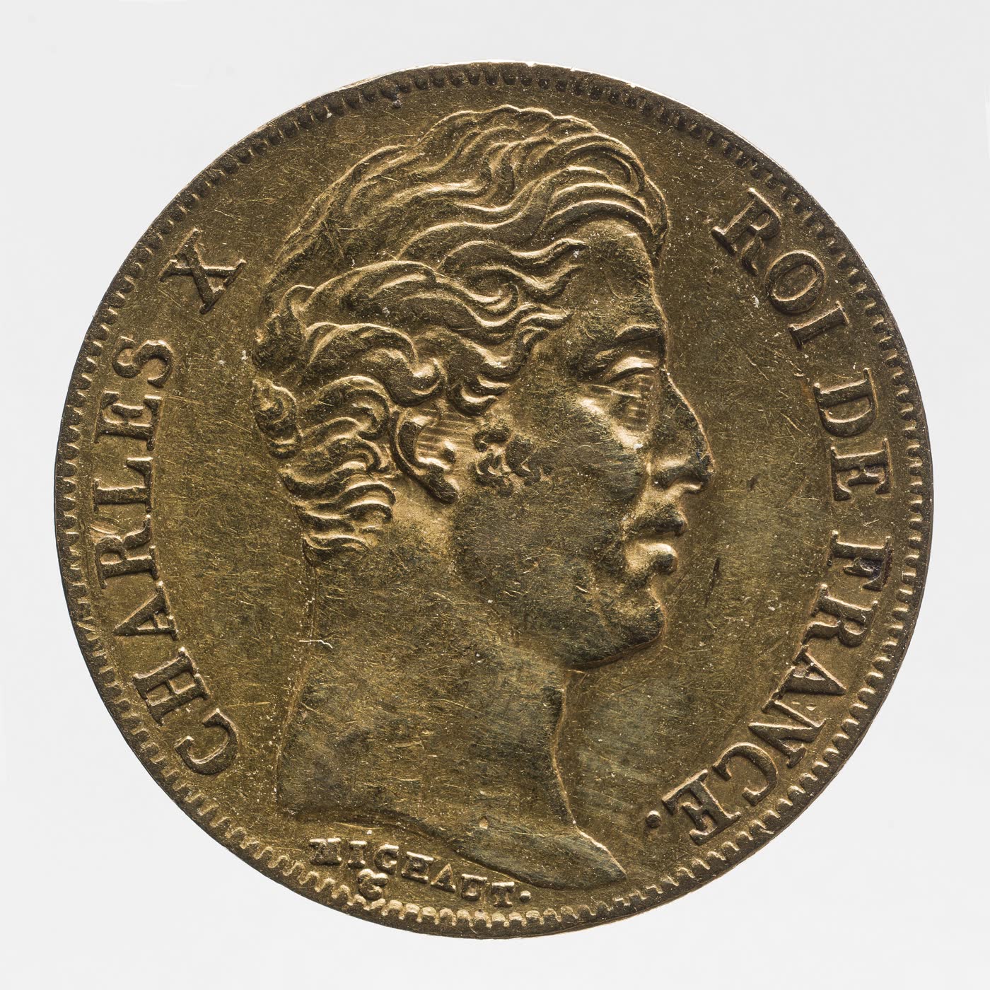 Moneda francesa de 20 francos con la cara de Carlos X (1830).